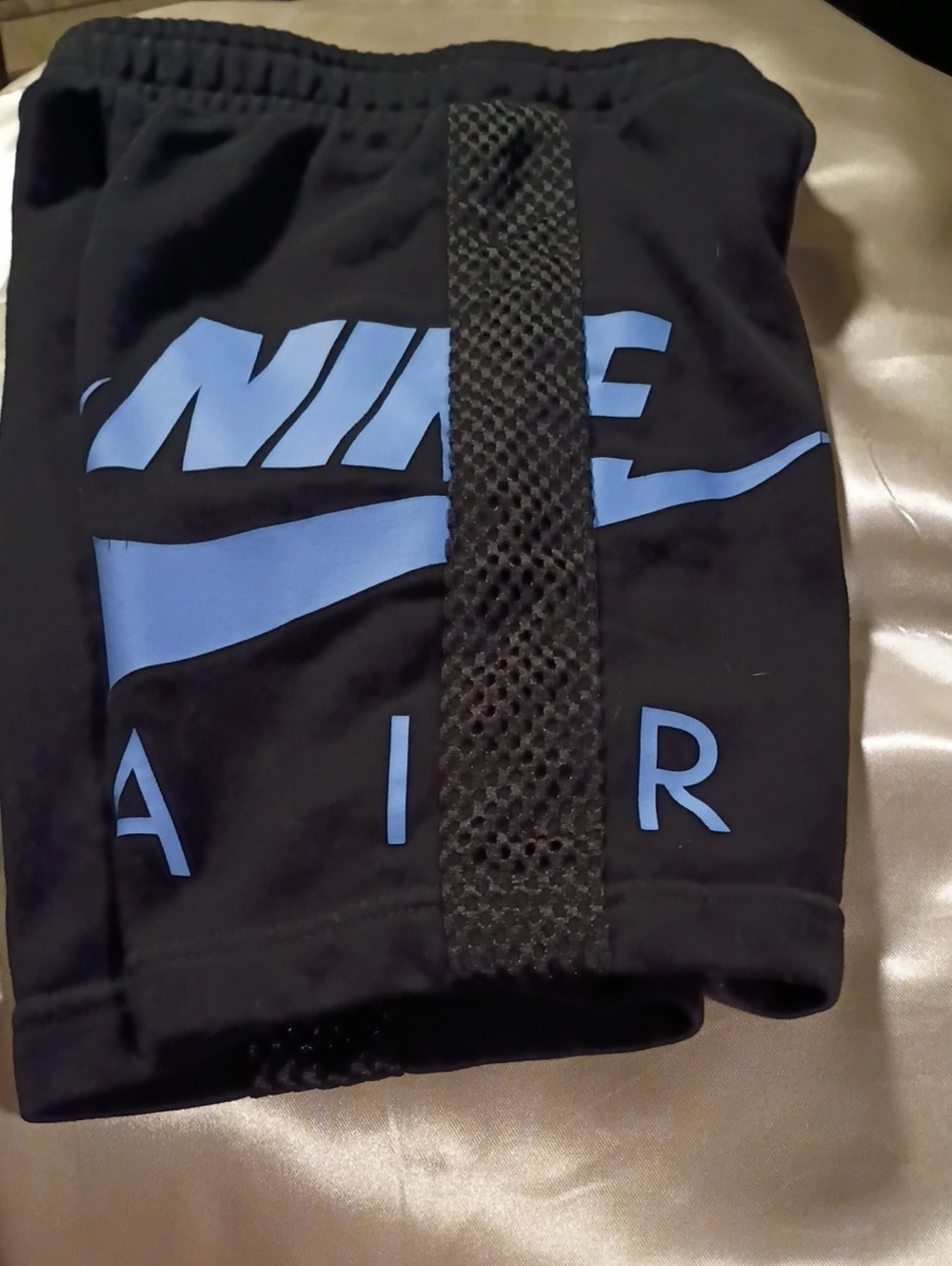 Nike Kids Black Shorts with Blue Logo